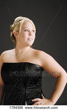 Stock Photograph - Young woman posing. Fotosearch