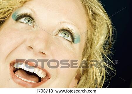 Stock Photo - Young woman smiling. Fotosearch