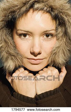 Young woman with winter coat View Large Photo Image Stock Photo - Young woman with winter coat. Fotosearch