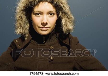 Young woman with winter coat View Large Photo Image Stock Photo - Young woman with winter coat. Fotosearch