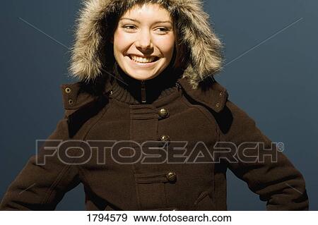 Young woman with winter coat View Large Photo Image Stock Photo - Young woman with winter coat. Fotosearch