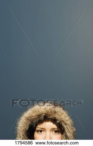 Young woman with winter coat View Large Photo Image Stock Photograph - Young woman with winter coat. Fotosearch
