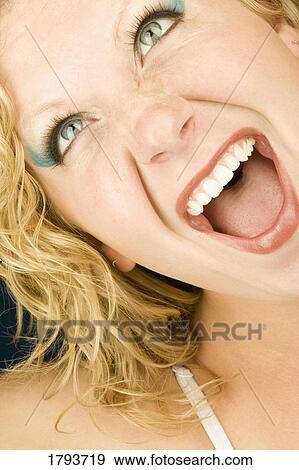Young woman yelling View Large Photo Image Stock Photo - Young woman yelling. Fotosearch