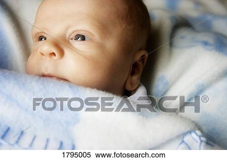 Baby under blanket View Large Photo Image Stock Photography - Baby under blanket. Fotosearch