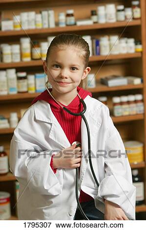 Stock Photo - Child pharmacist. Fotosearch