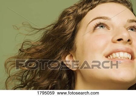 Close up of young adult female View Large Photo Image Stock Photo - Close up of young adult female. Fotosearch