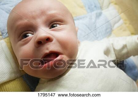 Stock Photo - Confused baby. Fotosearch