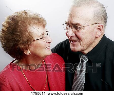 Stock Image - Couple looking at each other. Fotosearch