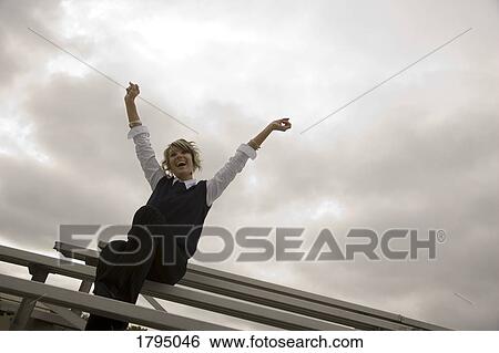 Fan cheering View Large Photo Image Stock Photograph - Fan cheering. Fotosearch