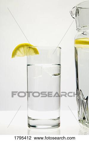 Glass and pitcher of water View Large Photo Image Stock Image - Glass and pitcher of water. Fotosearch
