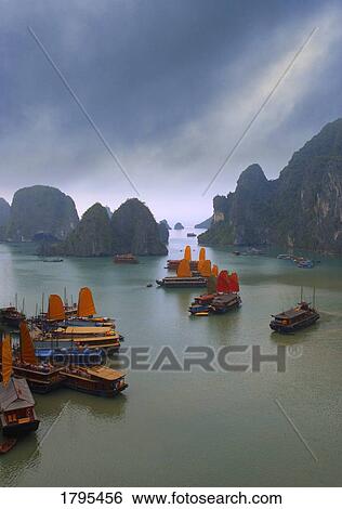Stock Photograph - Junks on Halong Bay. Fotosearch