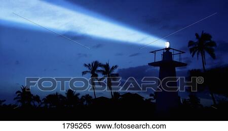 Stock Photography - Lighthouse at night. Fotosearch