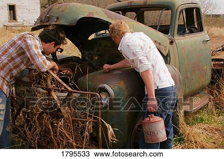 Looking at an antique truck View Large Photo Image Stock Image - Looking at an antique truck. Fotosearch