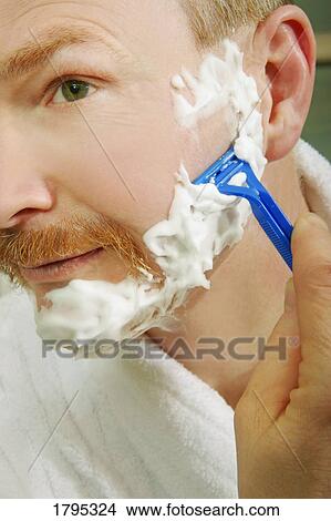 Picture - Man shaving. Fotosearch