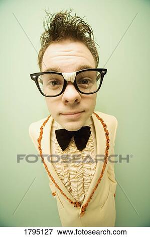Nerd wearing a vintage tuxedo View Large Photo Image Stock Photo - Nerd wearing a vintage tuxedo. Fotosearch