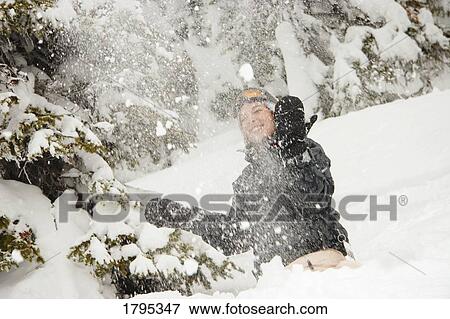 Stock Photo - Playing in the snow. Fotosearch