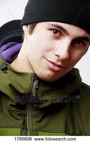 Stock Photo - Portrait of a man with hat. Fotosearch