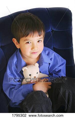 Portrait of a young boy View Large Photo Image Stock Image - Portrait of a young boy. Fotosearch