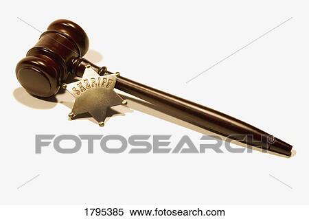Stock Photography - Sheriff's Badge and gavel. Fotosearch