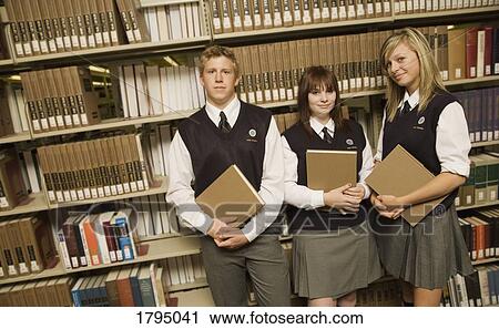 Students in the library View Large Photo Image Stock Image - Students in the library. Fotosearch