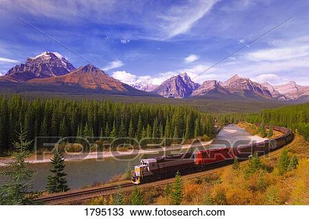 Stock Image - Train in Banff National Park. Fotosearch