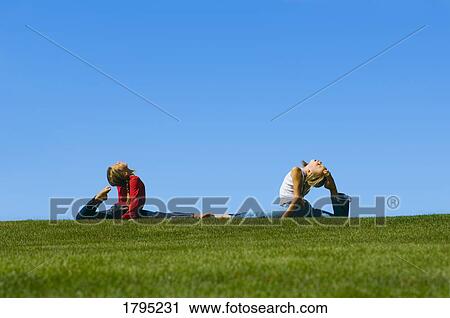 Stock Image - Two young girls with flexibility. Fotosearch
