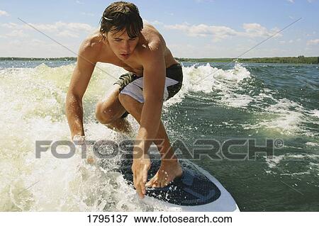 Wake surfing View Large Photo Image Stock Photo - Wake surfing. Fotosearch