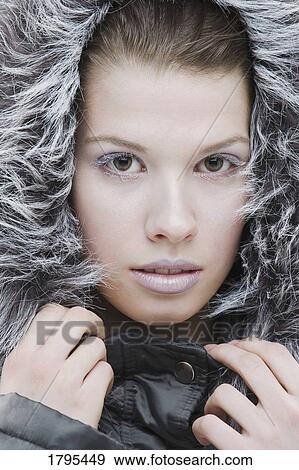 Woman wearing a winter jacket View Large Photo Image Stock Photo - Woman wearing a winter jacket. Fotosearch