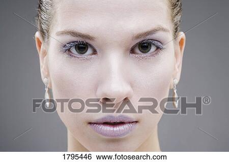 Stock Photograph - Woman wearing icy makeup. Fotosearch