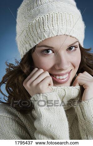 Stock Photo - Woman wearing winter clothing. Fotosearch