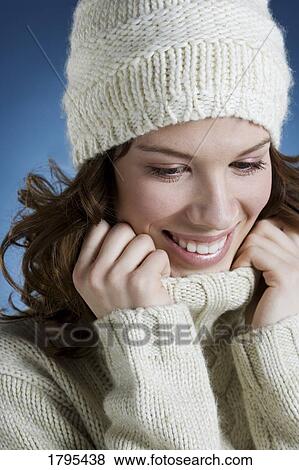 Stock Photo - Woman wearing winter clothing. Fotosearch