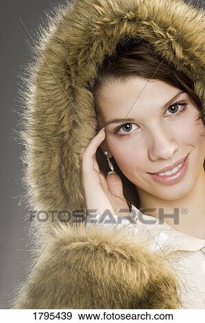 Woman wearing winter clothing View Large Photo Image Stock Photo - Woman wearing winter clothing. Fotosearch