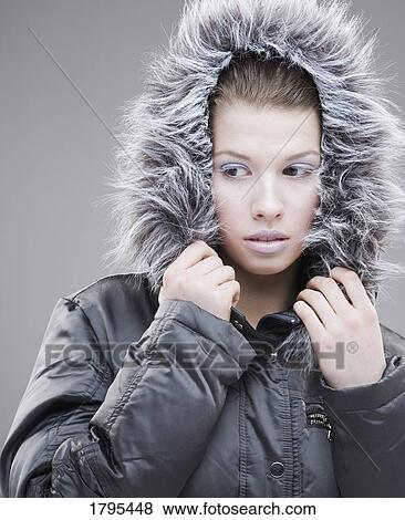 Woman with fur hood View Large Photo Image Stock Photo - Woman with fur hood. Fotosearch