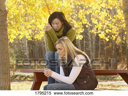 Women praying View Large Photo Image Stock Photography - Women praying. Fotosearch