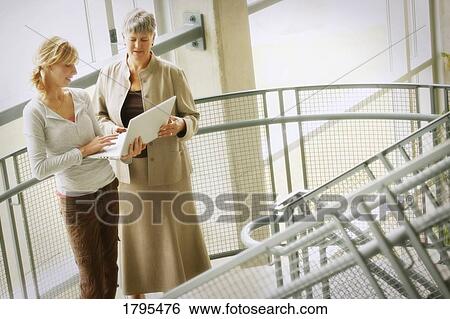 Women sharing insights View Large Photo Image Stock Photograph - Women sharing insights. Fotosearch
