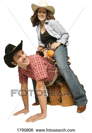 Stock Photograph - Couple wearing western clothing. Fotosearch