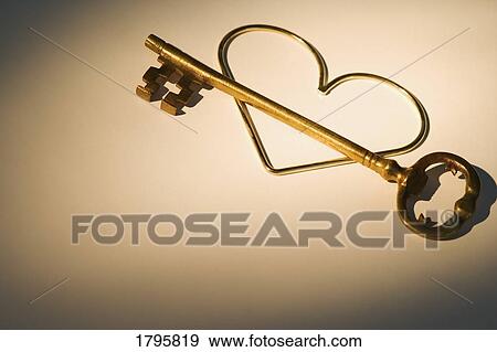Heart and key View Large Photo Image Stock Photo - Heart and key. Fotosearch