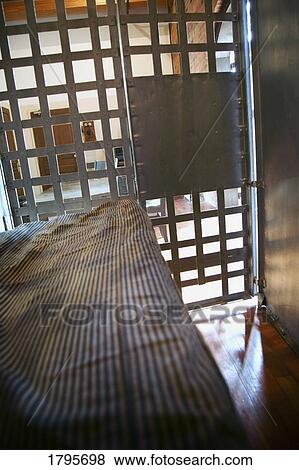 Old-fashioned jailhouse cell View Large Photo Image Stock Photo - Old-fashioned jailhouse cell. Fotosearch