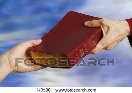 Passing a Bible View Large Photo Image Stock Image - Passing a Bible. Fotosearch