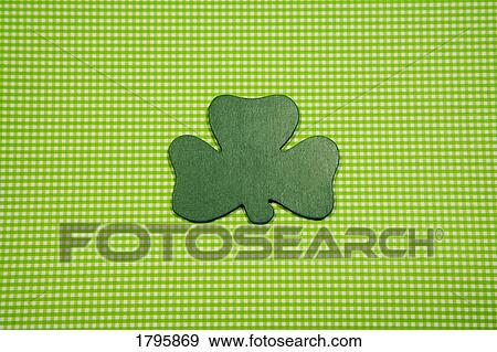 Stock Photo - Shamrock on a gingham background. Fotosearch