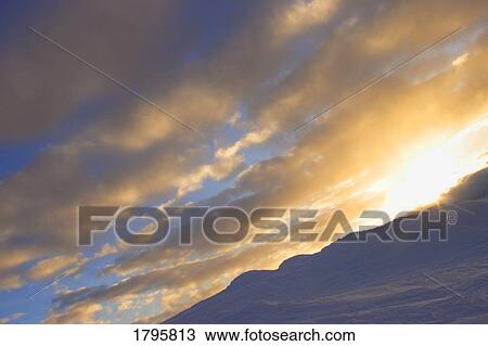 Sunlight through clouds View Large Photo Image Stock Image - Sunlight through clouds. Fotosearch
