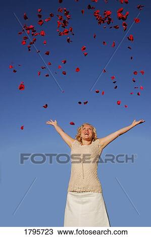 Woman celebrating View Large Photo Image Stock Image - Woman celebrating. Fotosearch