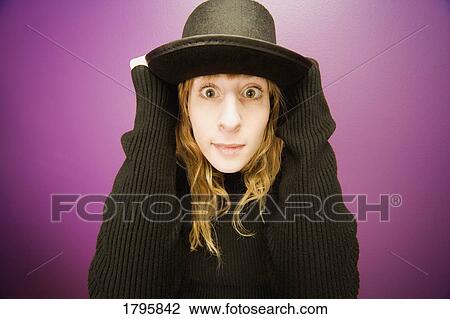 Woman wearing a hat View Large Photo Image Stock Image - Woman wearing a hat. Fotosearch
