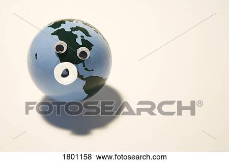 Stock Photo - A globe with an "uh-oh" face. Fotosearch