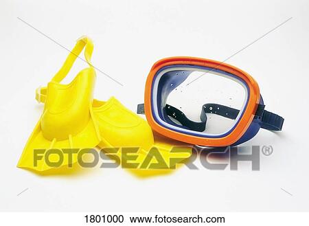 Stock Image - A pair of flippers and underwater mask. Fotosearch