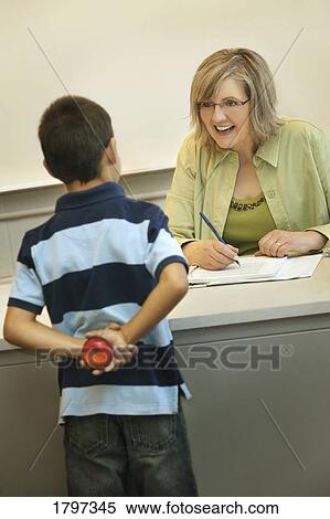 Stock Photography - Apple for the teacher. Fotosearch