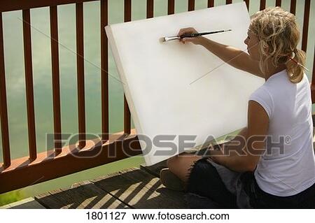 Stock Photo - Artist starting with a blank canvas . Fotosearch