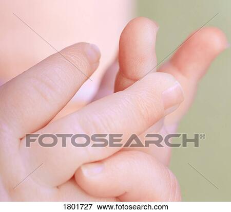Stock Photo - Baby hands. Fotosearch