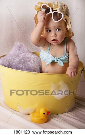 Baby in a bathtub View Large Photo Image Stock Image - Baby in a bathtub . Fotosearch