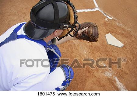 Stock Photography - Back catcher ready to catch the ball. Fotosearch